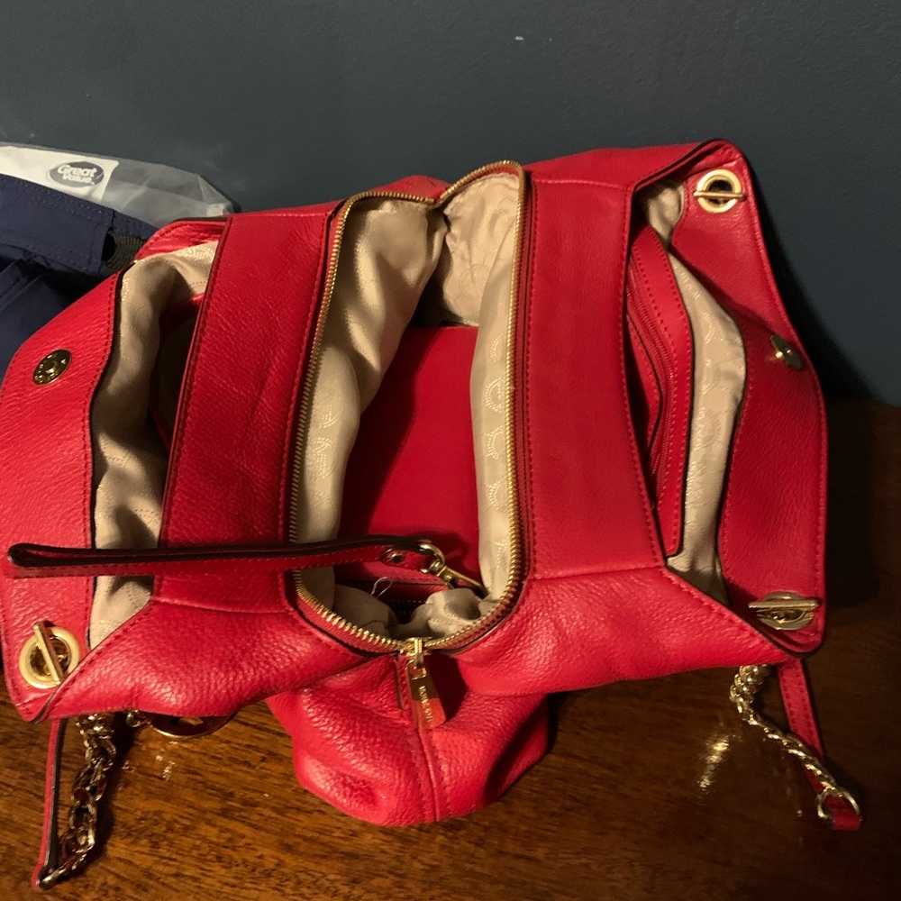 Red Michael Kors handbag